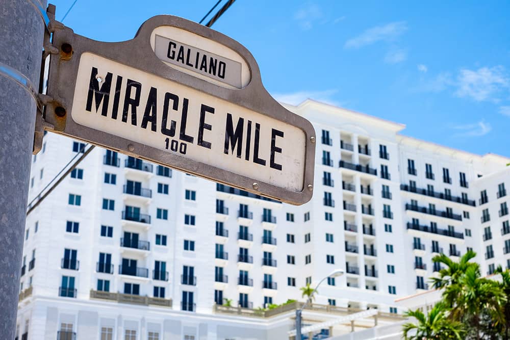 Cityscape view of the intersection of Miracle Mile and Galiano Street in Coral Gables, Florida