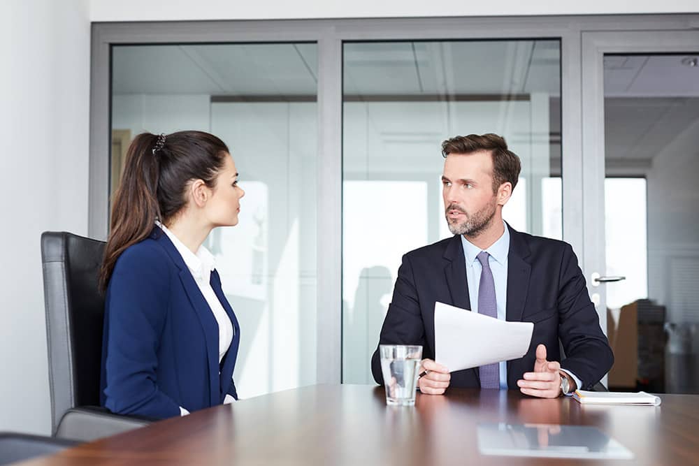 Job interview - recruiter talking with female candidate